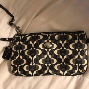Black and white coach wristlet